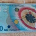 Cât a ajuns să coste acum celebra bancnotă emisă de BNR cu eclipsa de soare din 1999